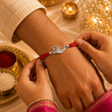 Silver "Bhai" Name Rakhi – Elegant Script Charm on Handwoven Red Thread