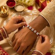 Silver Shri Rakhi – Auspicious Shri Charm on Traditional Red Thread