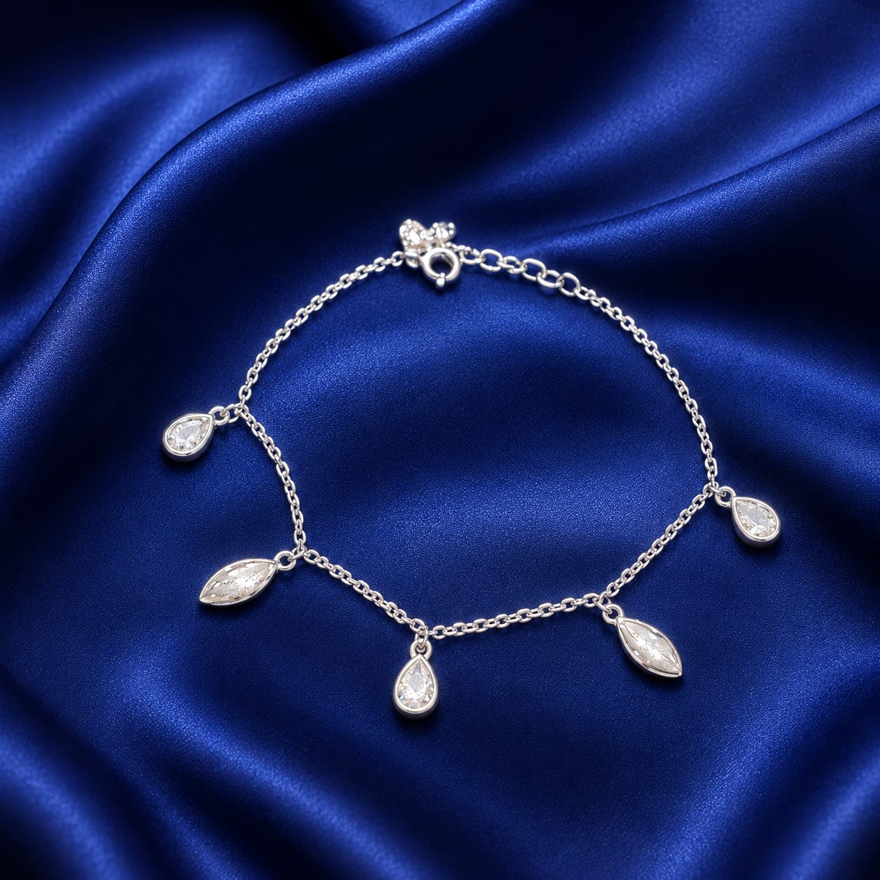 Celestia Drops Silver Bracelet – Elegant Teardrop Zircon Charm Bracelet (JRG431)