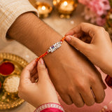 Silver "Love Brother" Rakhi – Heart Accent Script Charm on Traditional Red & Yellow Thread