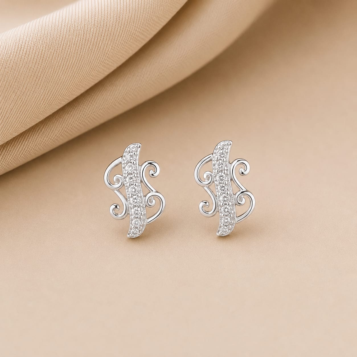 Elegant Swirl Silver Stud Earrings – Pavé Zircon Designer Studs