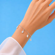 Celestia Drops Silver Bracelet – Elegant Teardrop Zircon Charm Bracelet (JRG431)
